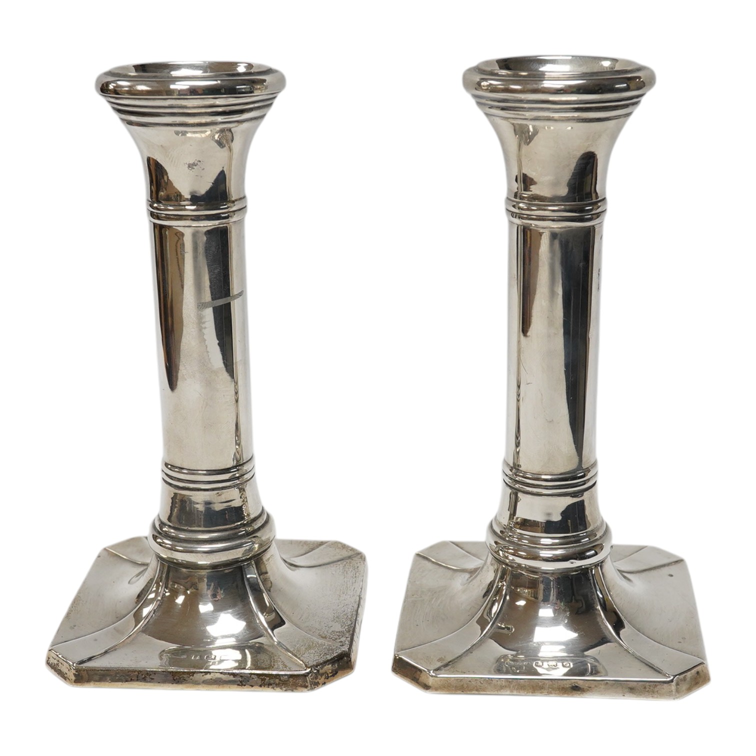 A pair of George V silver mounted dwarf candlesticks, by S. Blankensee & Son Ltd, Birmingham, 1913, 16.2cm, loaded. Condition - poor to fair